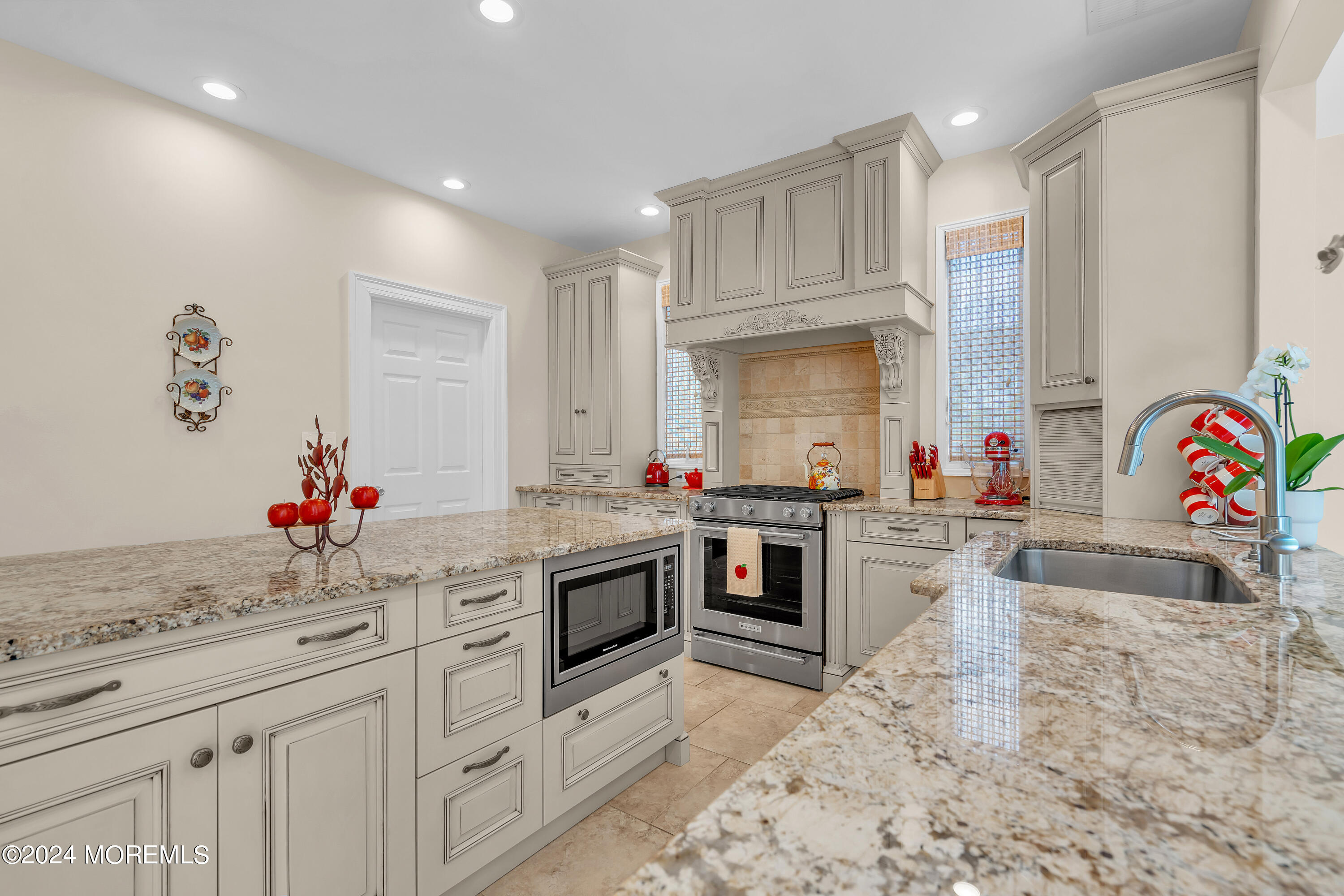 2050 MacKenzie Road Toms River, NJ 08755 - Photo 35 of 95 a kitchen with stainless steel appliances granite countertop a sink stove and cabinets