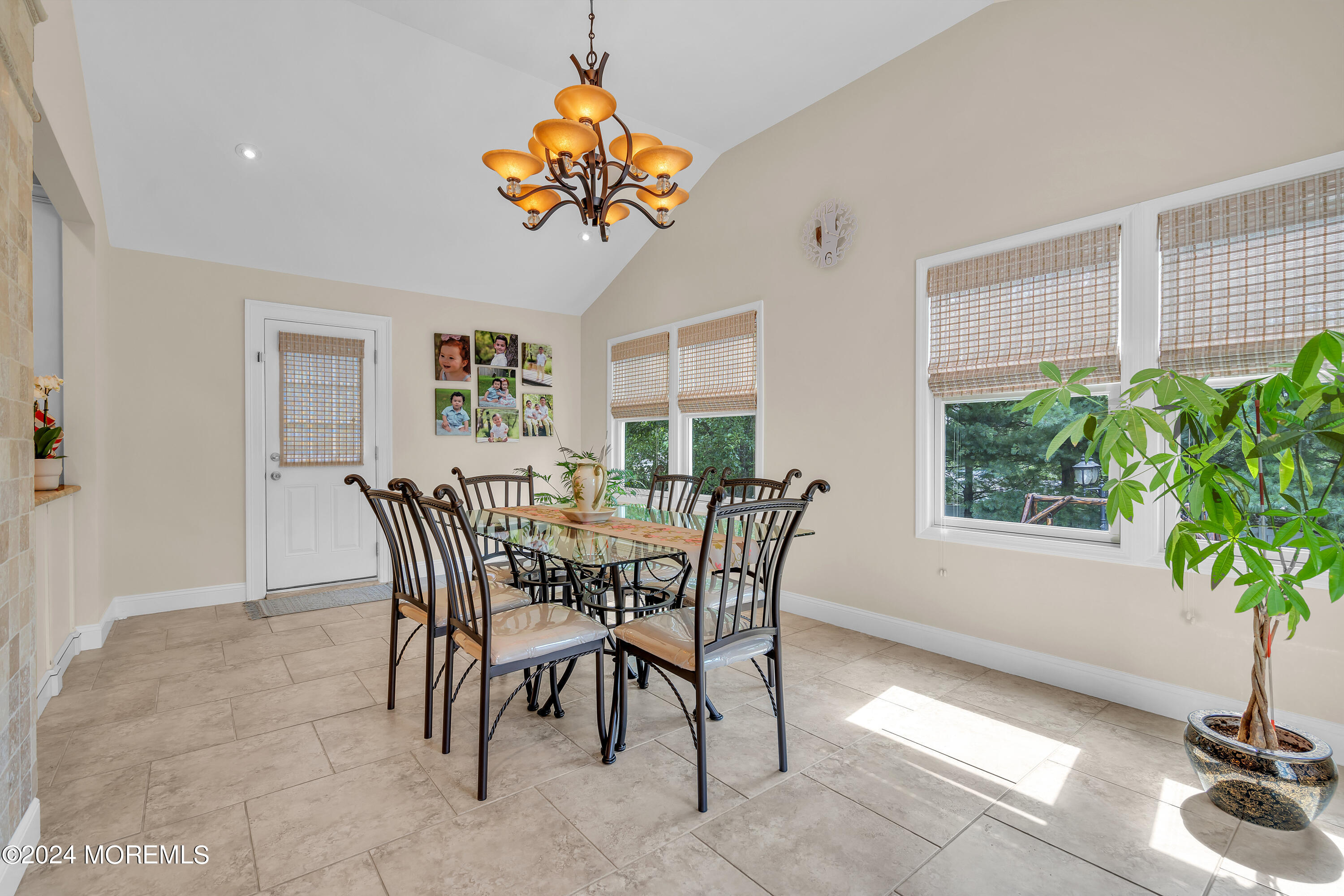 2050 MacKenzie Road Toms River, NJ 08755 - Photo 38 of 95 a view of a dining room with furniture and a potted plant