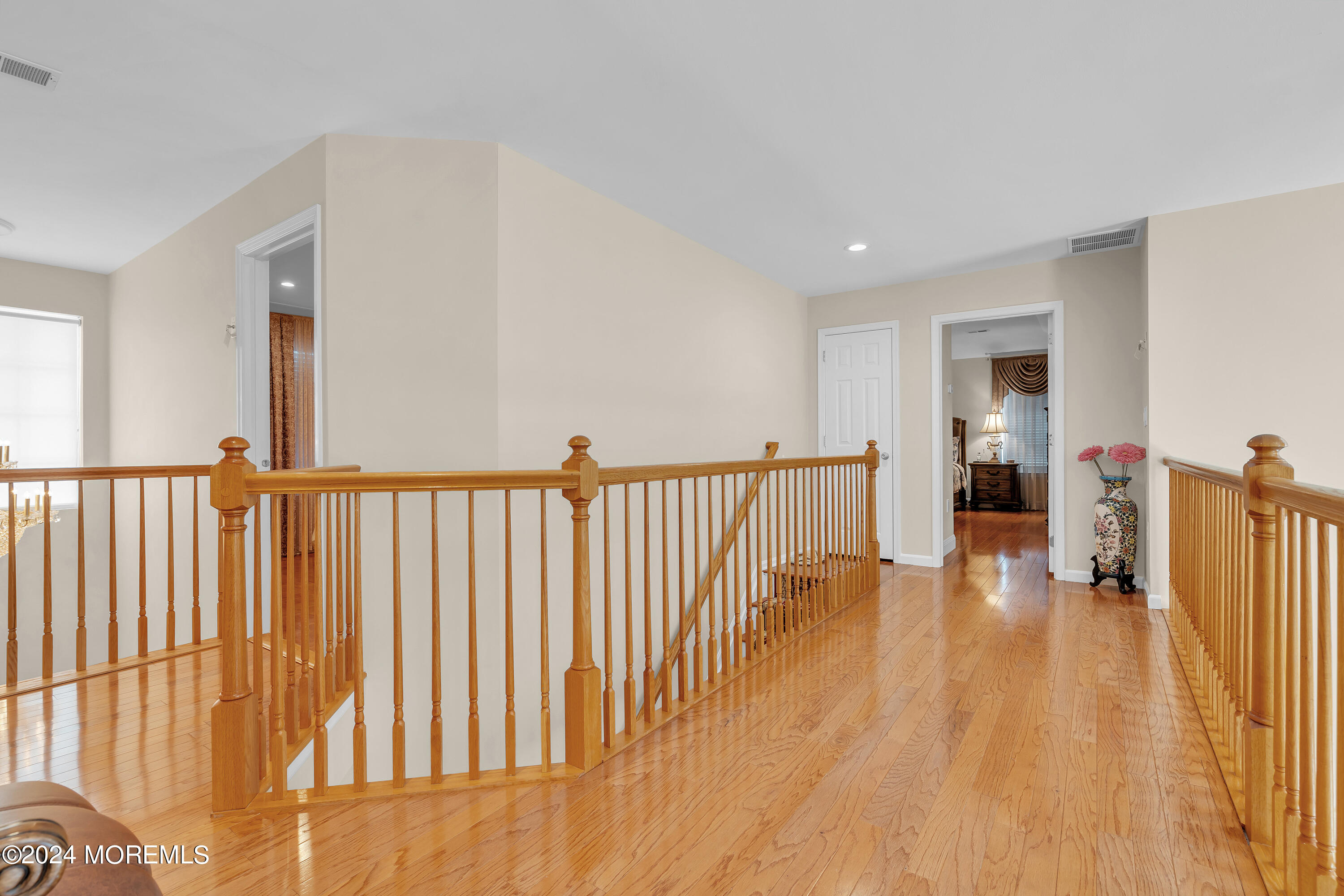2050 MacKenzie Road Toms River, NJ 08755 - Photo 47 of 95 a view of a hallway with wooden floor