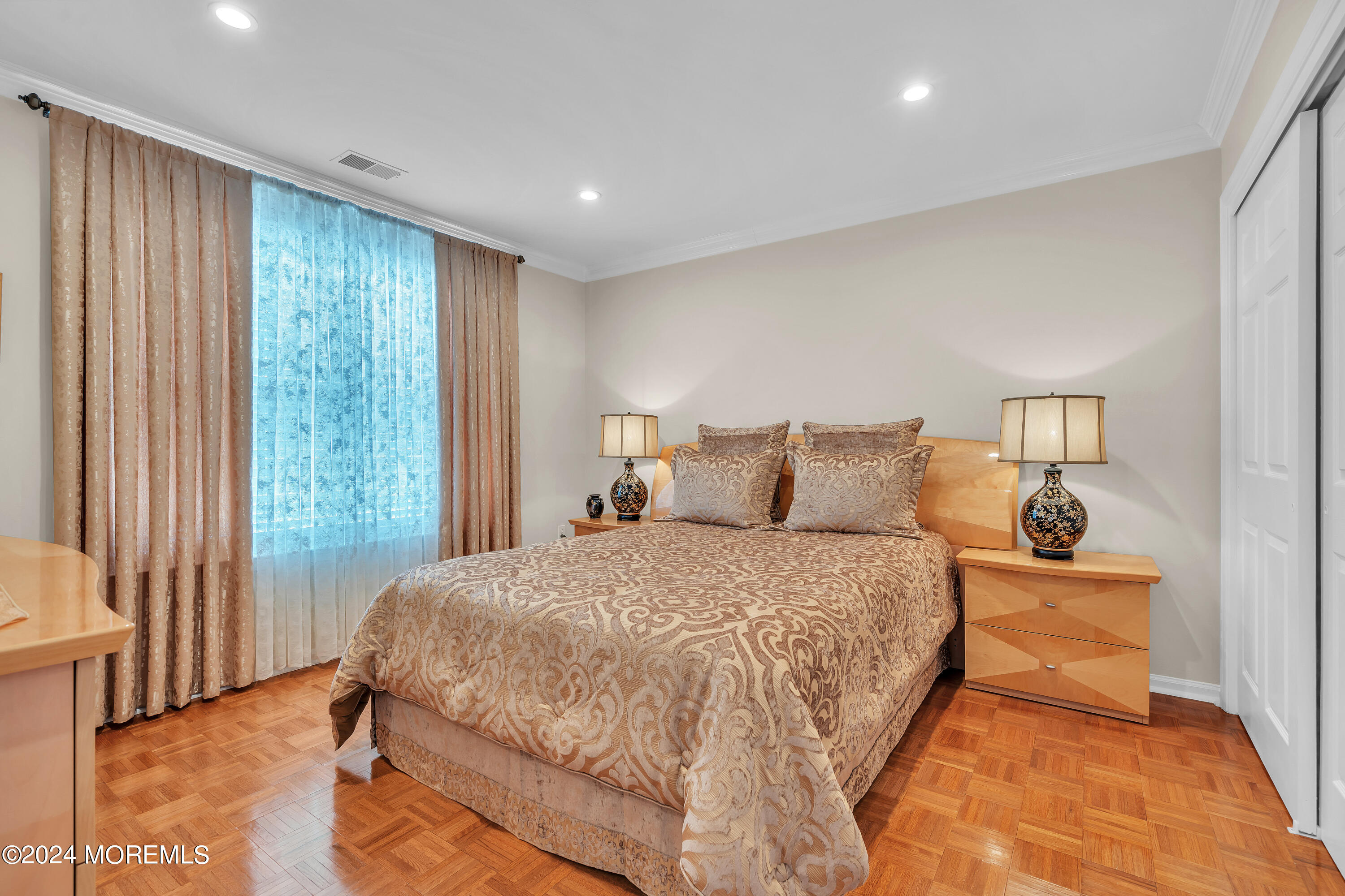 2050 MacKenzie Road Toms River, NJ 08755 - Photo 52 of 95 a bed sitting in a spacious bedroom next to a window