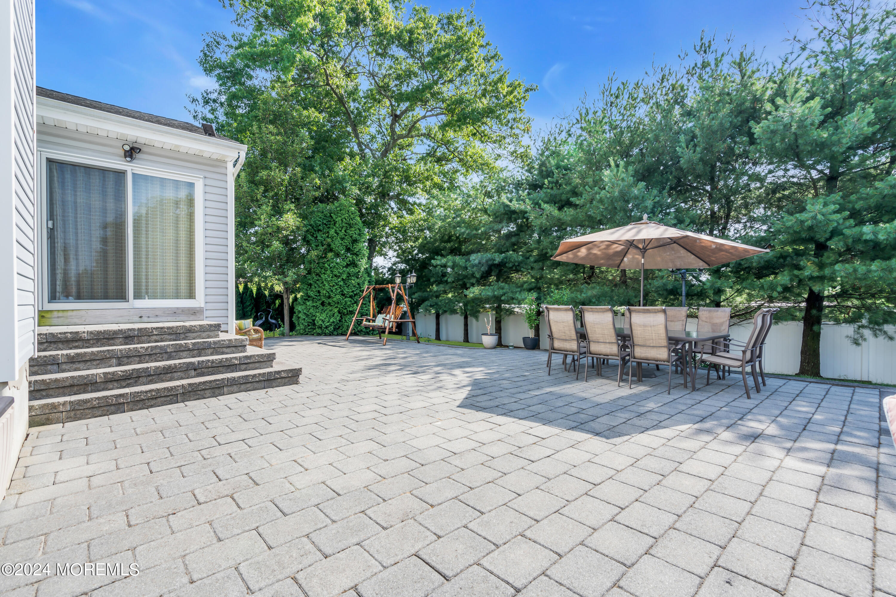2050 MacKenzie Road Toms River, NJ 08755 - Photo 66 of 95 a backyard of a house with barbeque oven table and chairs