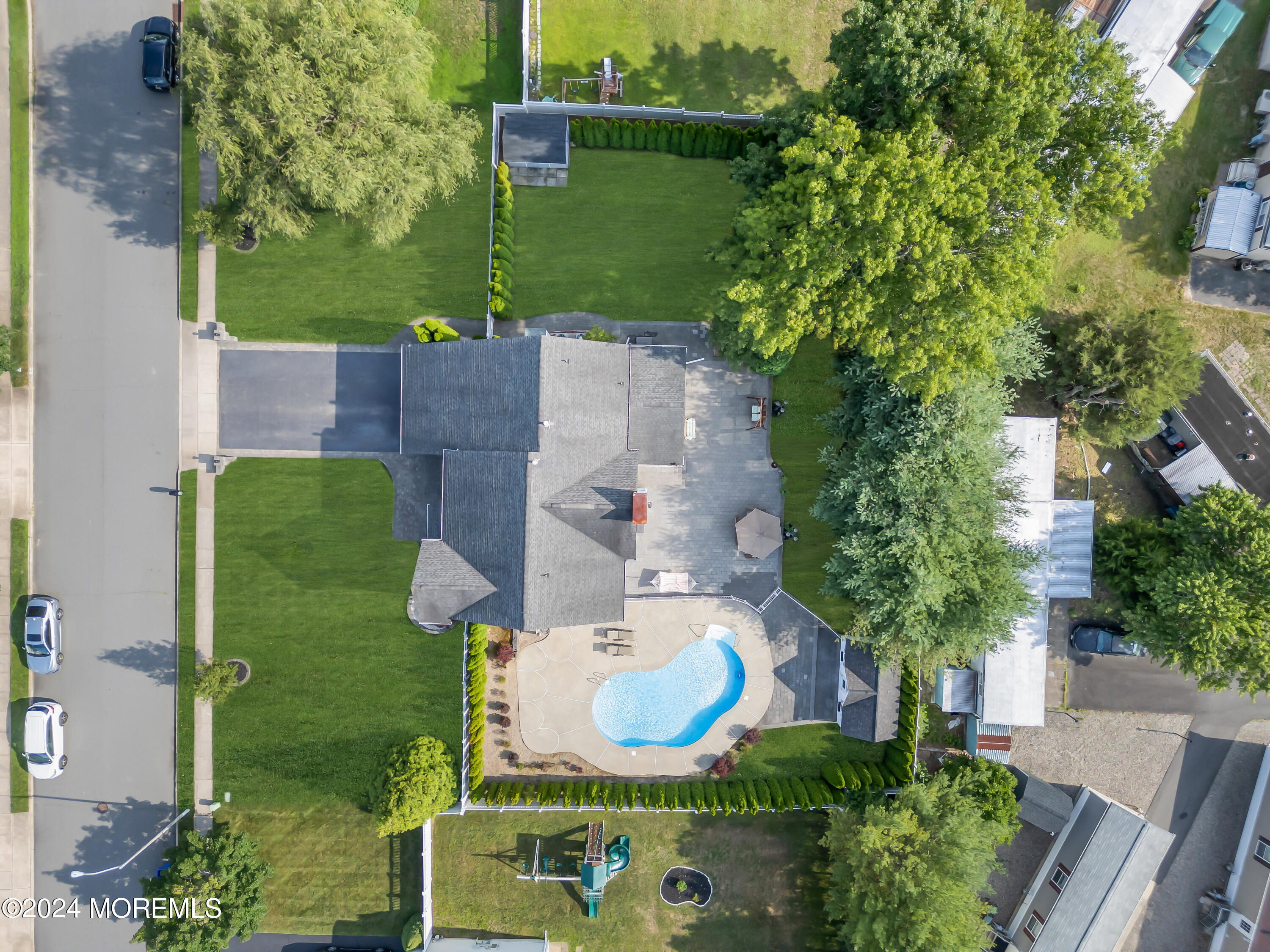 2050 MacKenzie Road Toms River, NJ 08755 - Photo 7 of 95 an aerial view of a house with outdoor space and a lake view