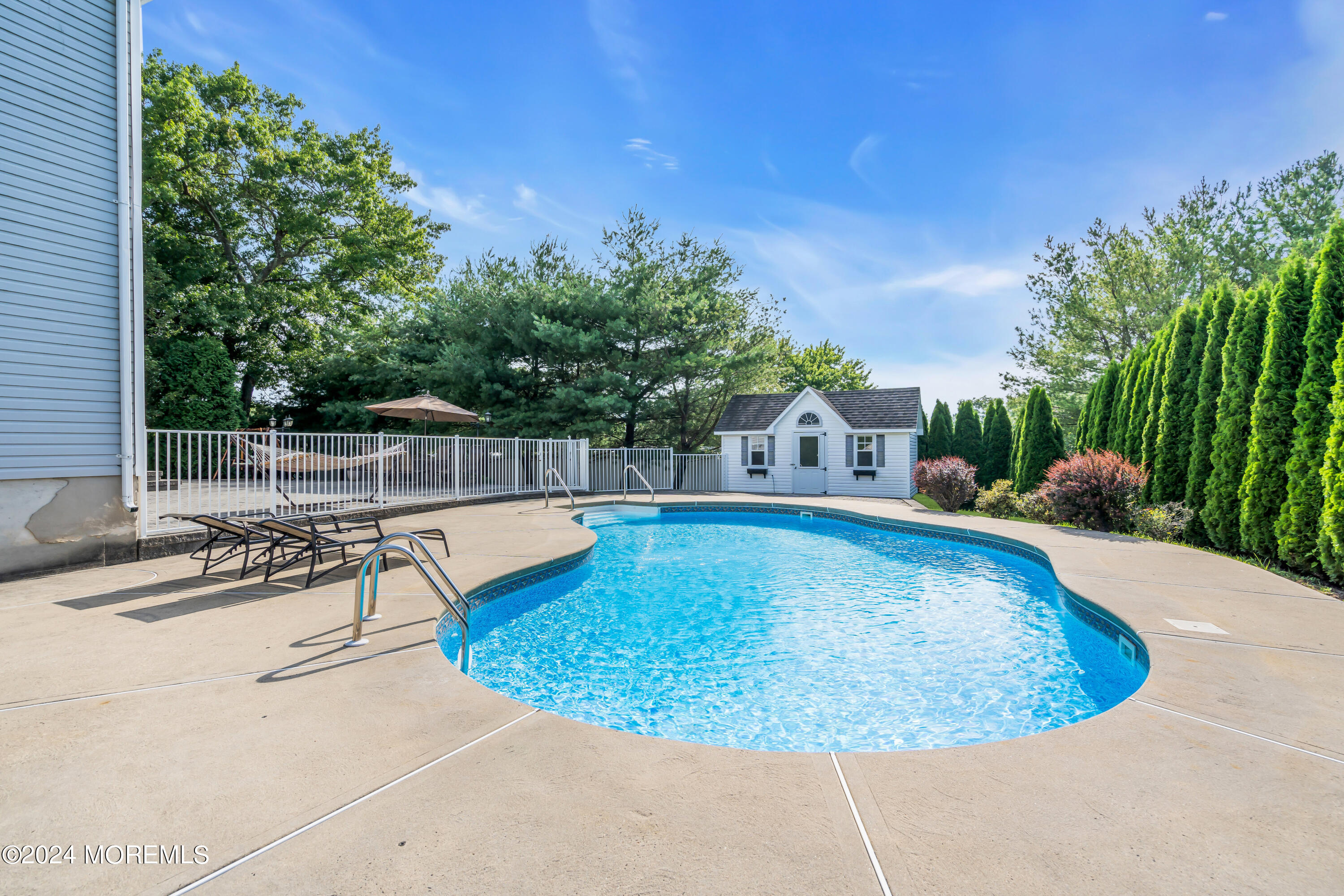 2050 MacKenzie Road Toms River, NJ 08755 - Photo 78 of 95 a view of a swimming pool with a patio