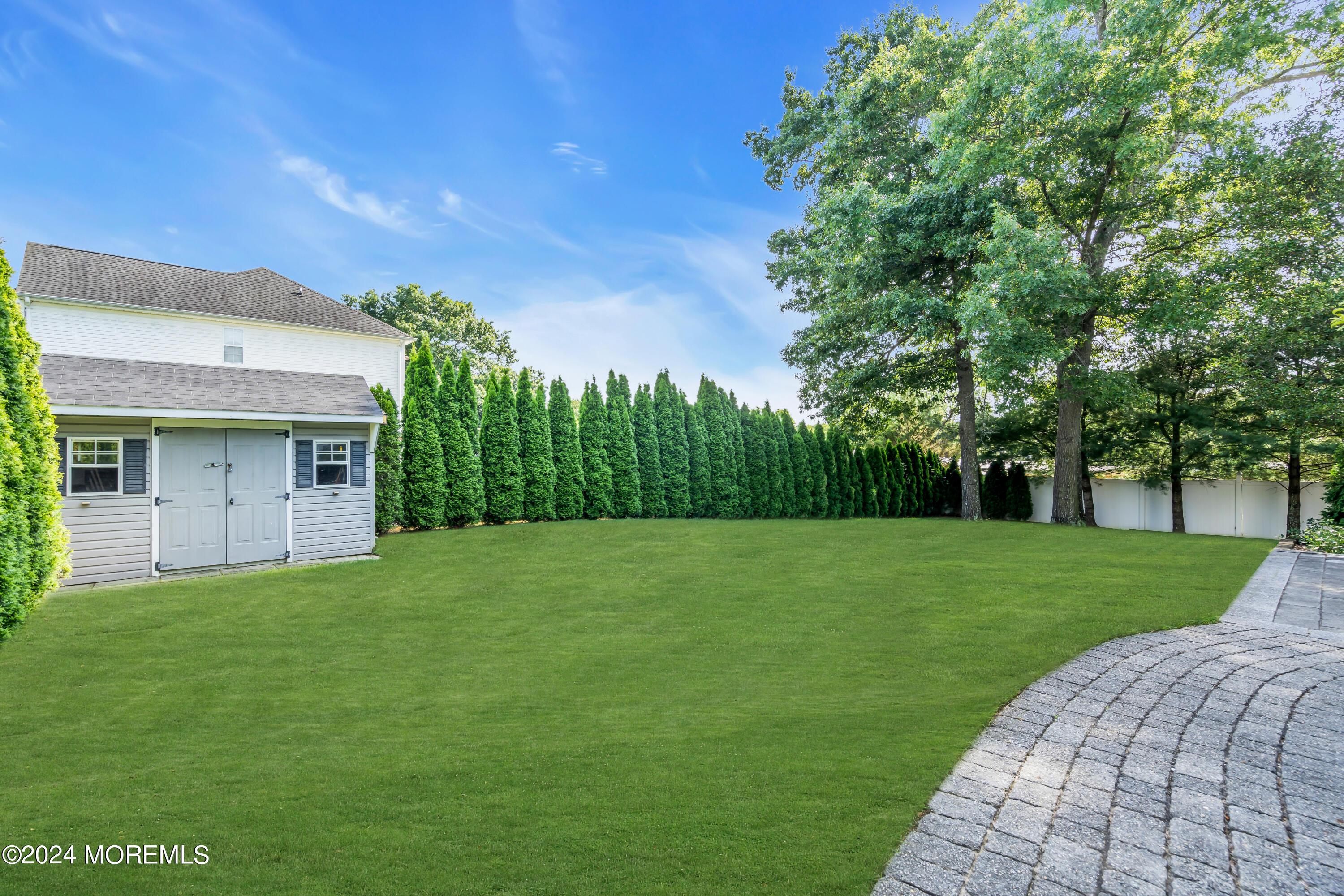 2050 MacKenzie Road Toms River, NJ 08755 - Photo 81 of 95 a view of a big yard with a house
