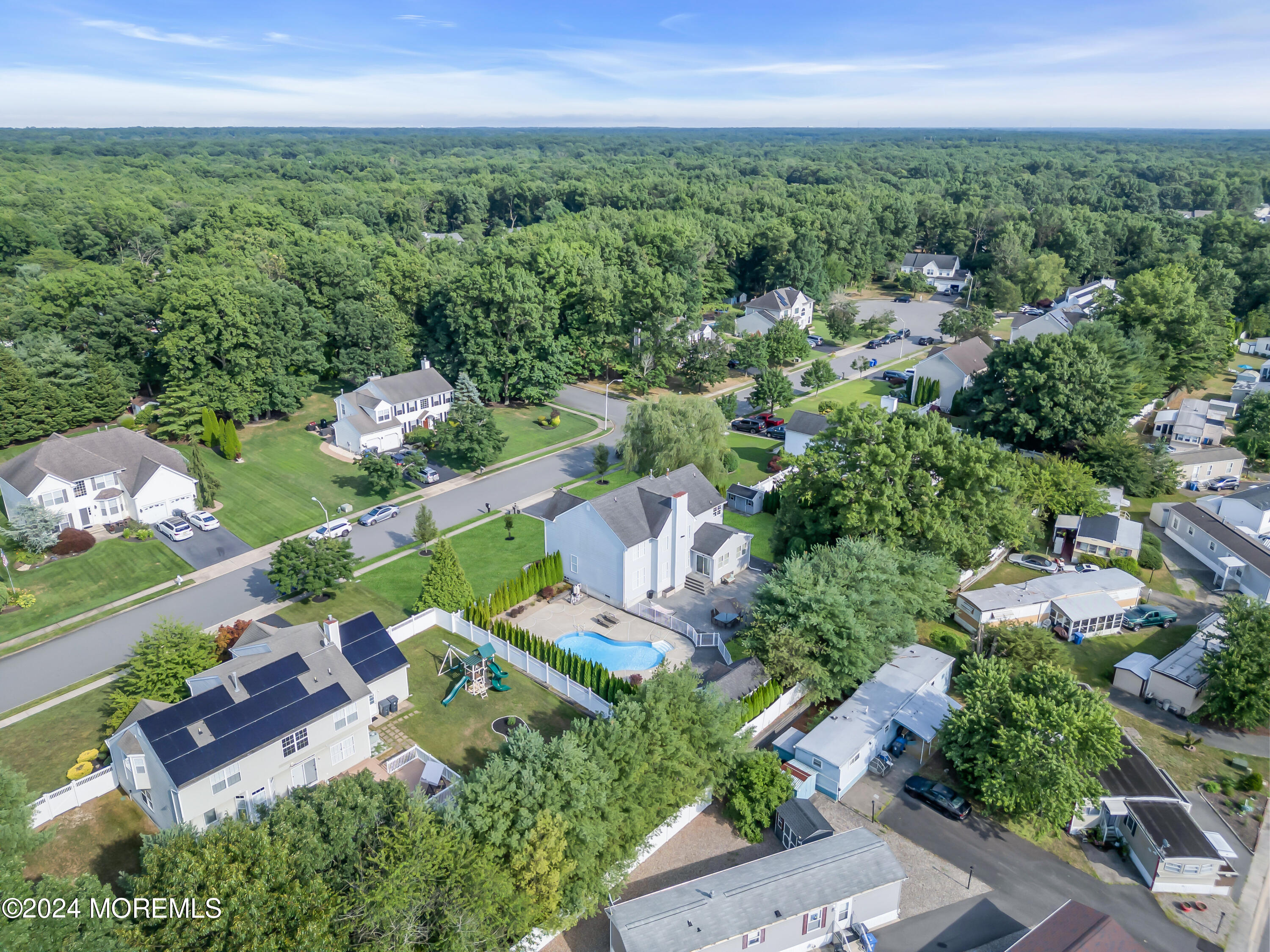2050 MacKenzie Road Toms River, NJ 08755 - Photo 91 of 95 an aerial view of a city with lots of residential buildings