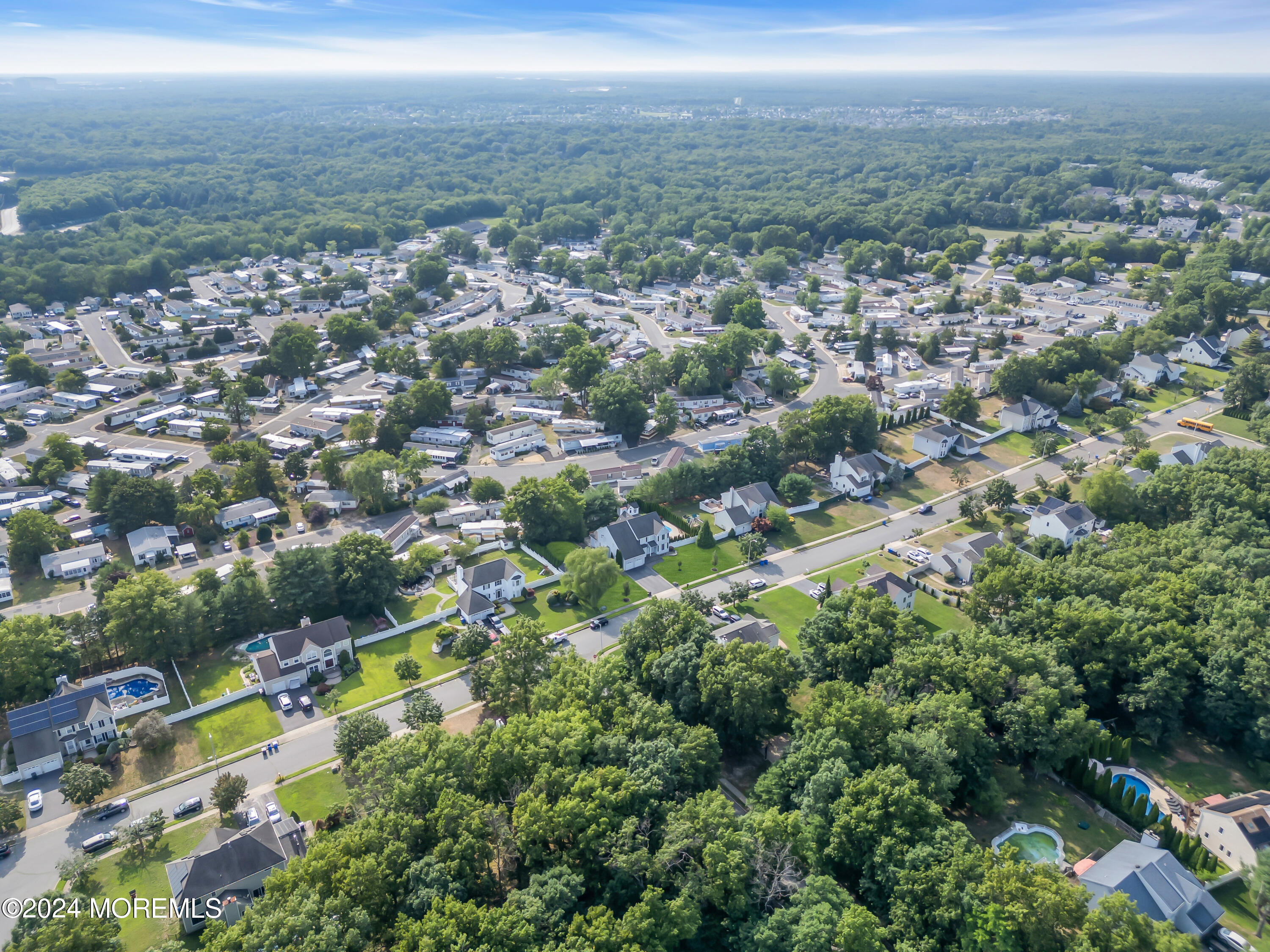 2050 MacKenzie Road Toms River, NJ 08755 - Photo 93 of 95 an aerial view of residential houses with outdoor space and trees