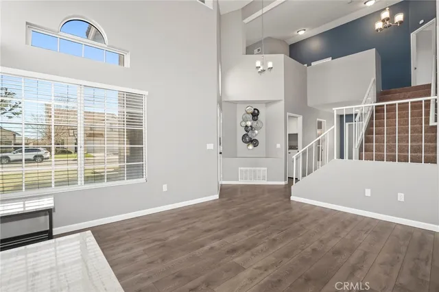 a view of livingroom with furniture and windows