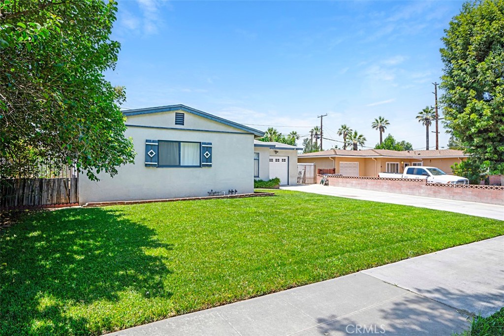 3076 Ronald Street Riverside, CA 92506 - Photo 3 of 26 a house view with a garden space