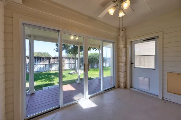 a view of an house with backyard space and garden