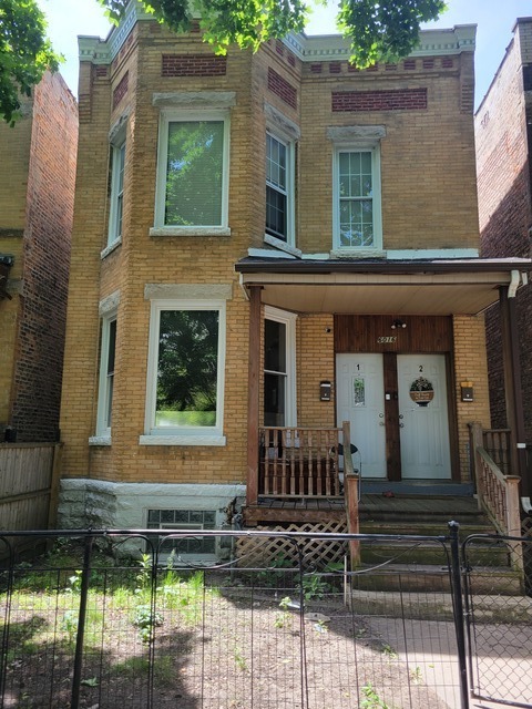 6016 South Carpenter Street Chicago, IL 60621 - Photo 1 of 15 a front view of a house