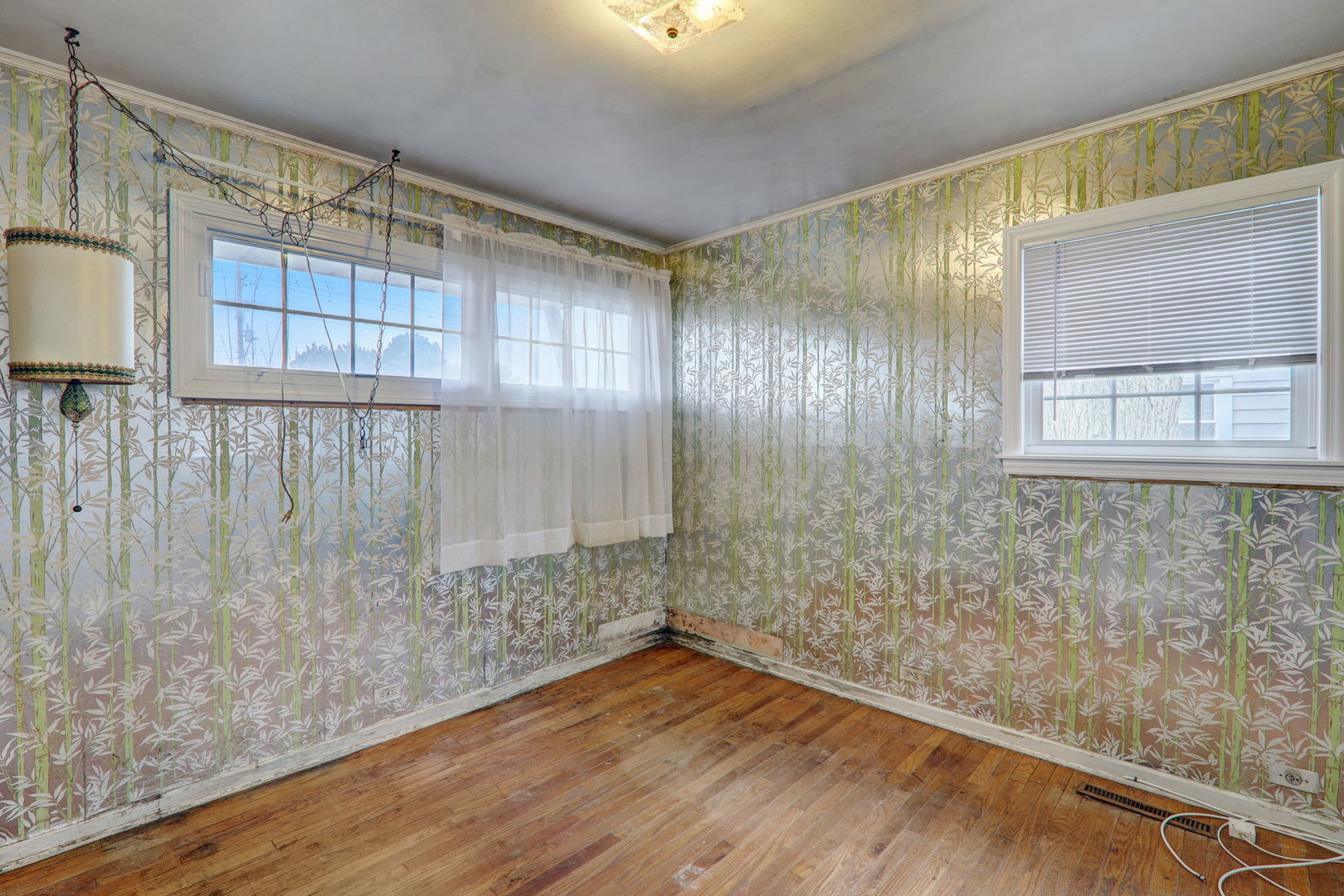 7125 Simpson Street Morton Grove, IL 60053 - Photo 18 of 28 a view of an empty room with a window