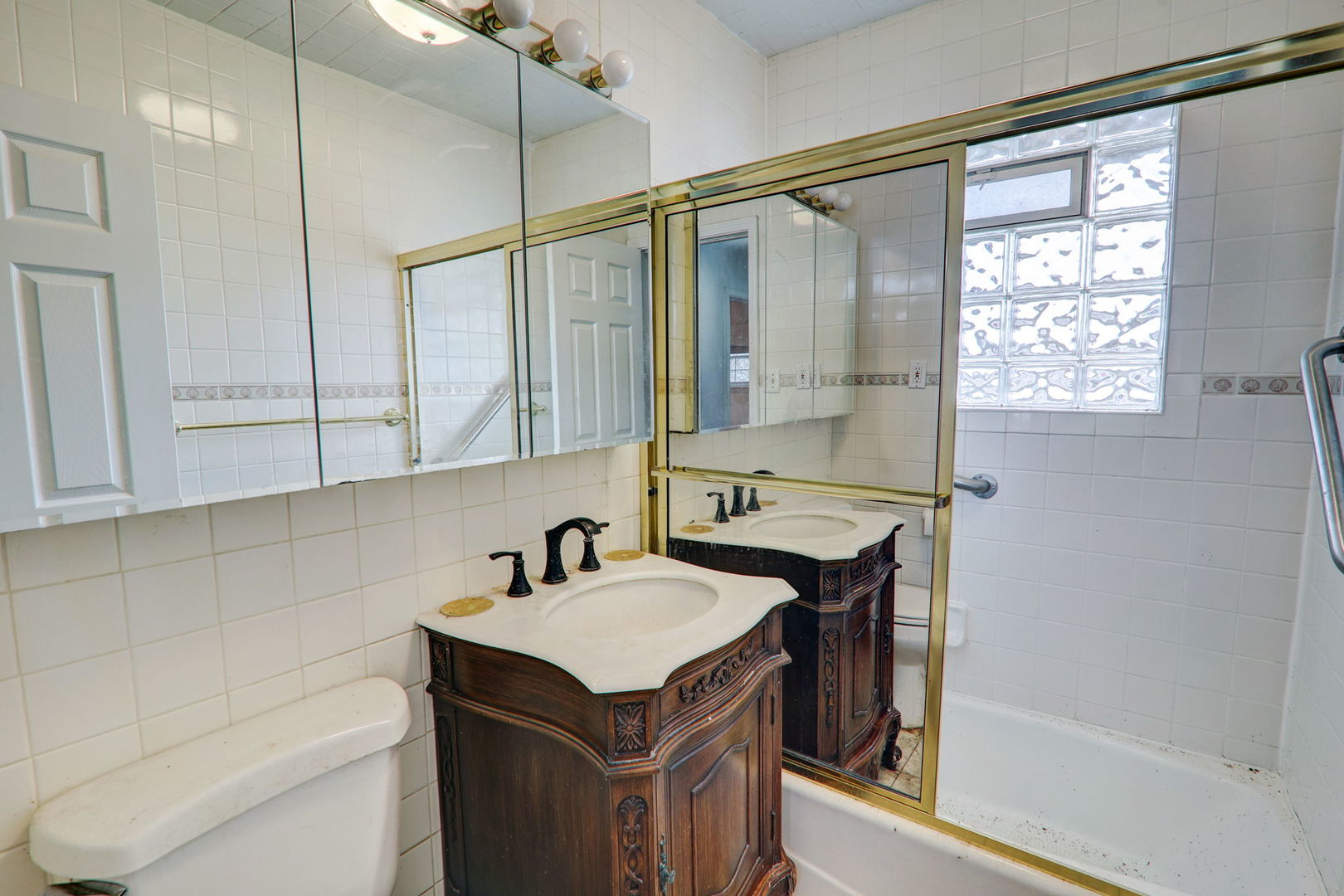 7125 Simpson Street Morton Grove, IL 60053 - Photo 21 of 28 a bathroom with a sink and a mirror