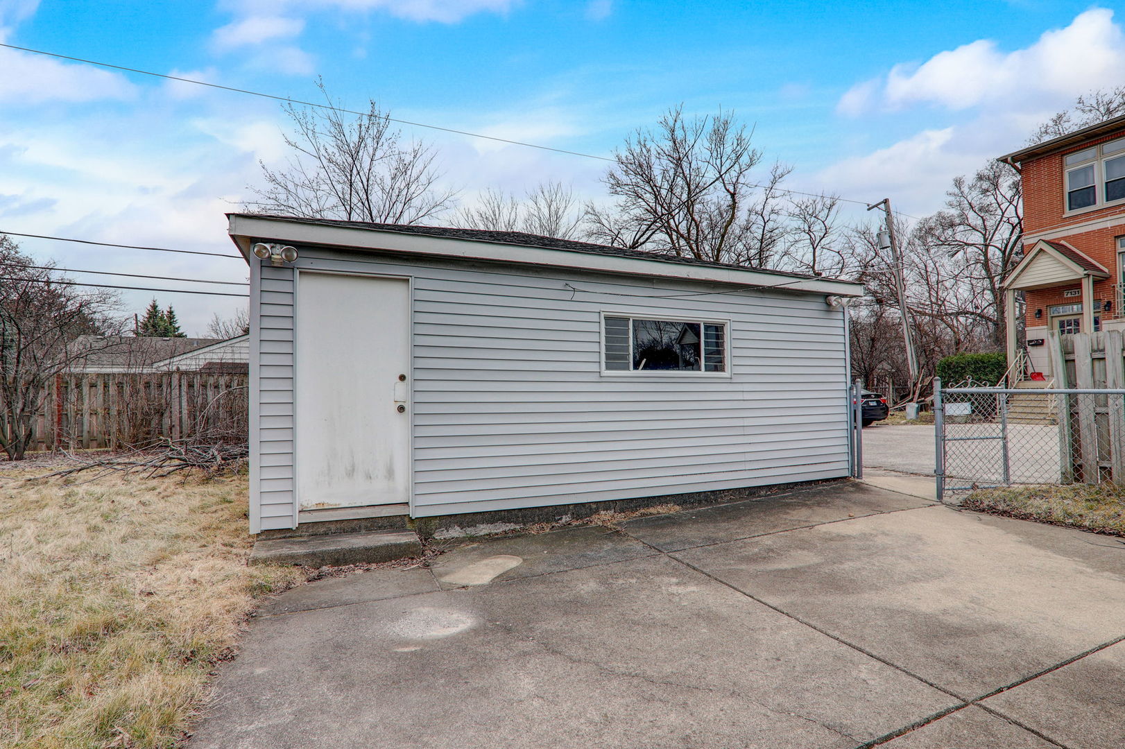 7125 Simpson Street Morton Grove, IL 60053 - Photo 23 of 28 a view of a house with a fence
