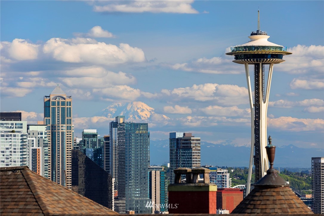 104 Highland Drive Seattle, WA 98109 - Photo 1 of 39 a view of a city with tall buildings