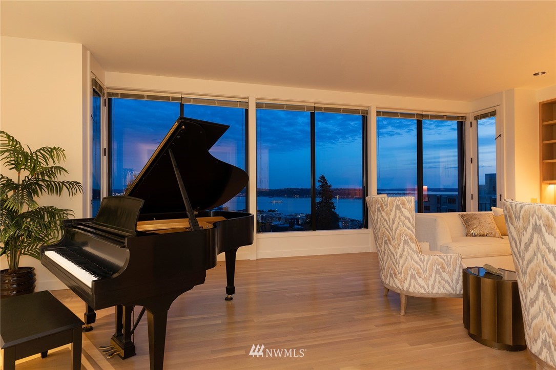 104 Highland Drive Seattle, WA 98109 - Photo 11 of 39 a living room with furniture a air conditioner vent and a window