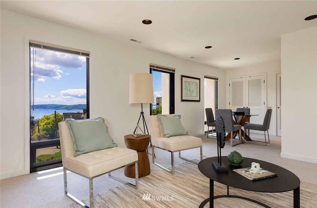 104 Highland Drive Seattle, WA 98109 - Photo 28 of 39 a living room with furniture and a potted plant