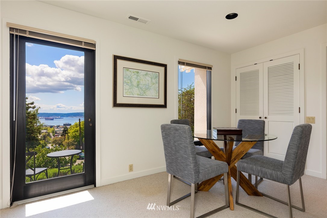 104 Highland Drive Seattle, WA 98109 - Photo 29 of 39 a view of a livingroom with furniture and front door
