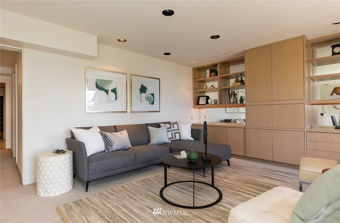 104 Highland Drive Seattle, WA 98109 - Photo 30 of 39 a living room with furniture and wooden floor