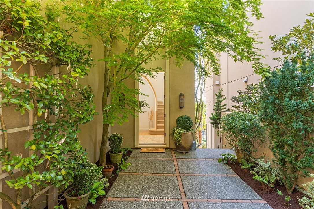 104 Highland Drive Seattle, WA 98109 - Photo 5 of 39 a view of a back yard