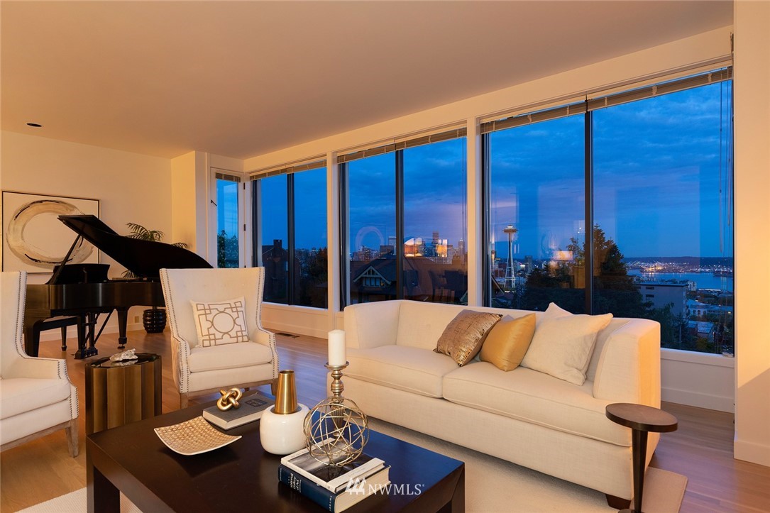 104 Highland Drive Seattle, WA 98109 - Photo 10 of 39 a living room with furniture and wooden floor