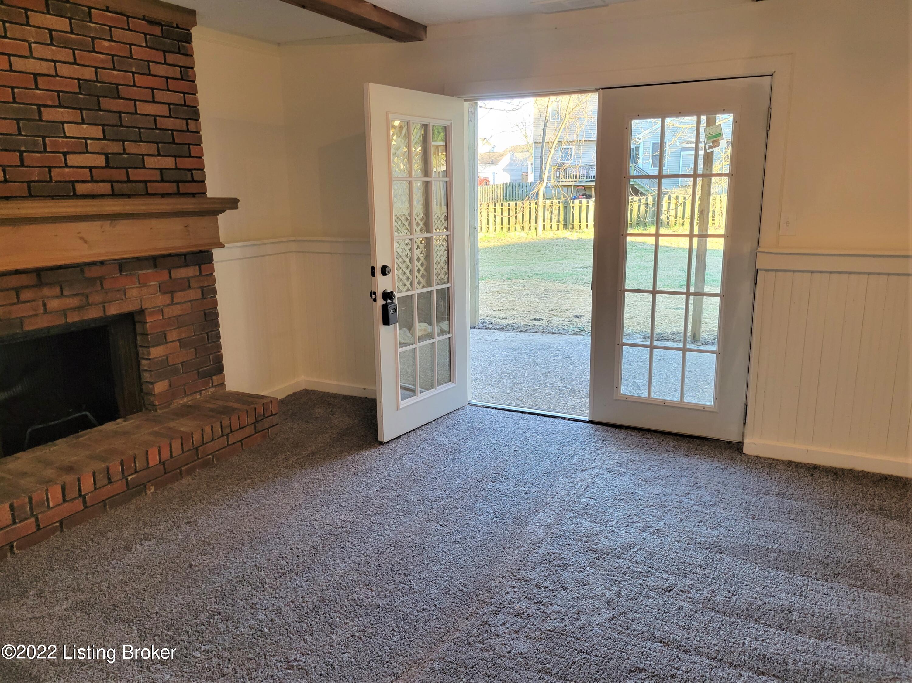 5018 Woodsend Road Louisville, KY 40229 - Photo 38 of 74 Cozy up by the fire in the Family Room