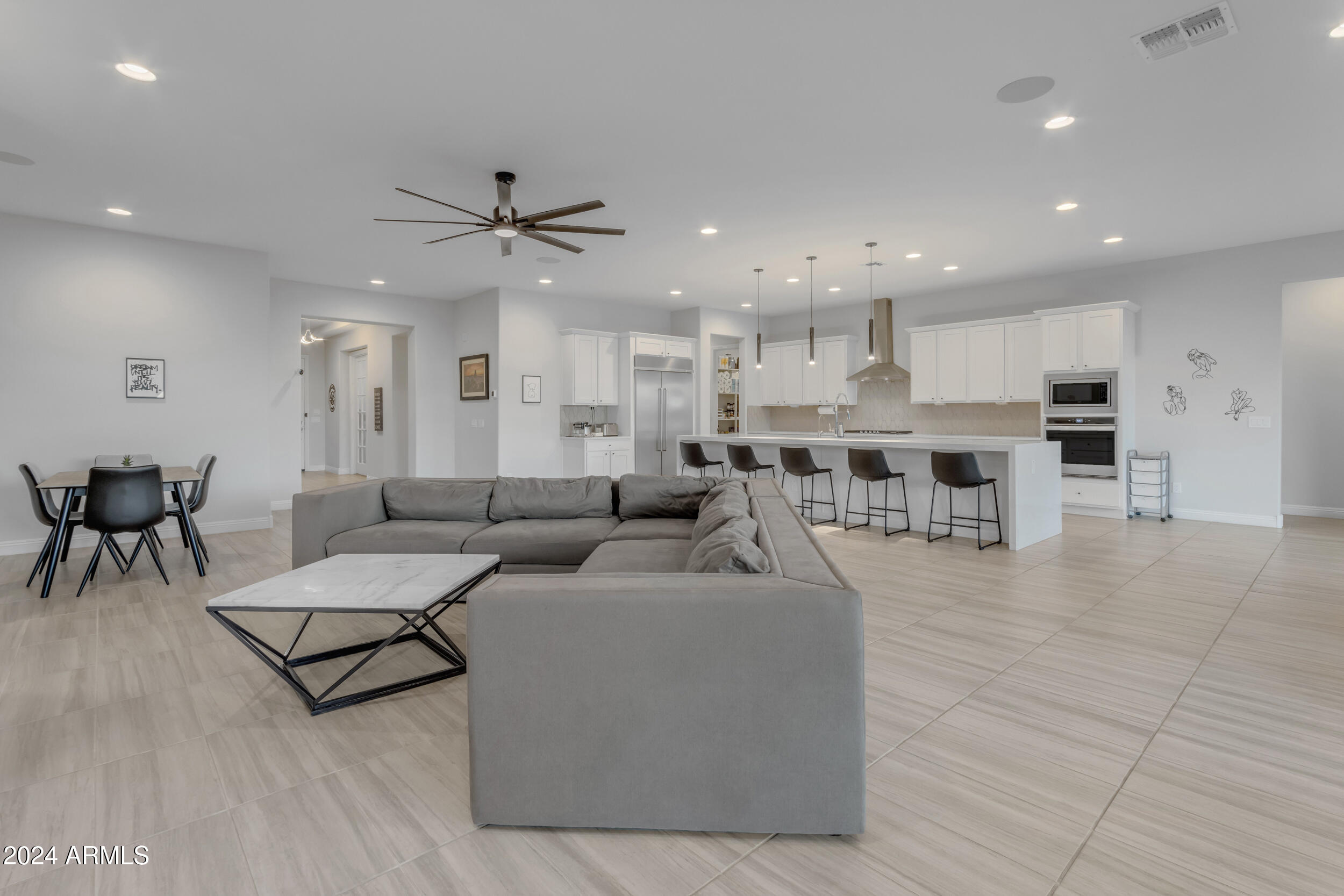 22678 East Stacey Road Queen Creek, AZ 85142 - Photo 15 of 101 a living room view with furniture and kitchen view