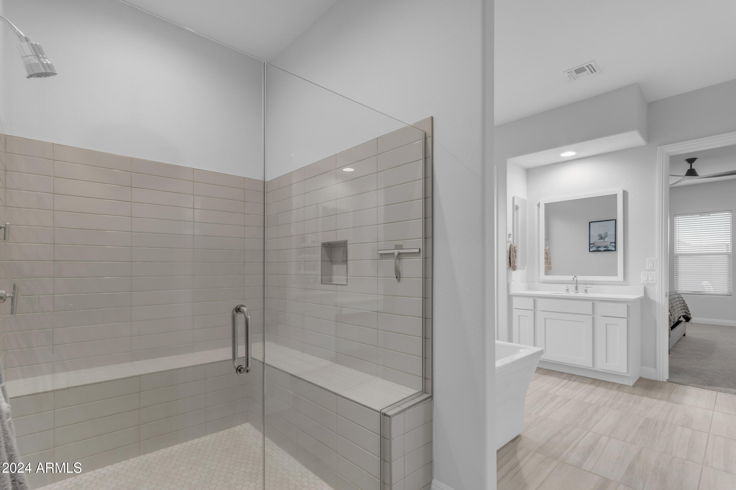 22678 East Stacey Road Queen Creek, AZ 85142 - Photo 39 of 101 a bathroom with a bathtub and a shower