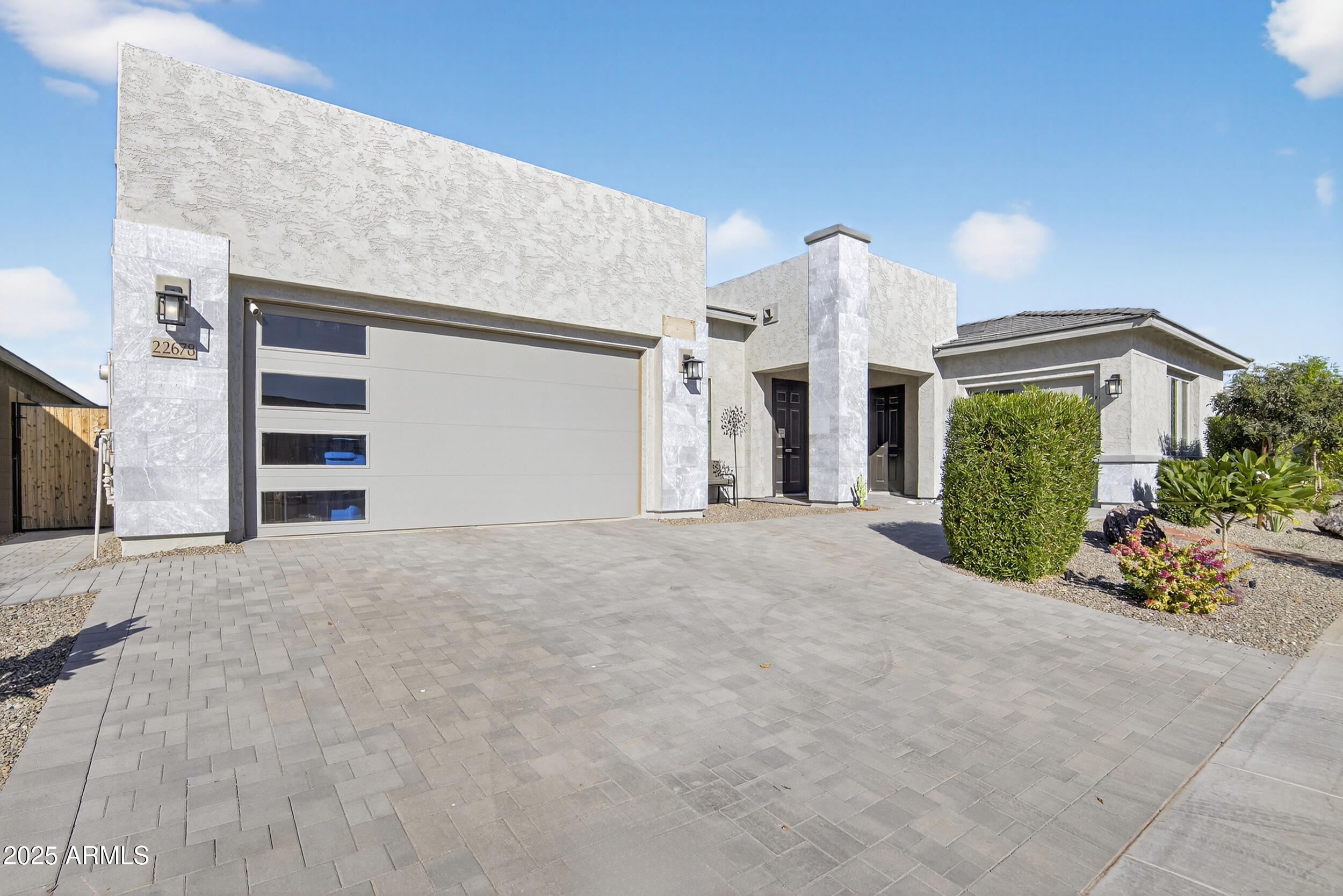 22678 East Stacey Road Queen Creek, AZ 85142 - Photo 4 of 101 a view of a house with a yard and garage