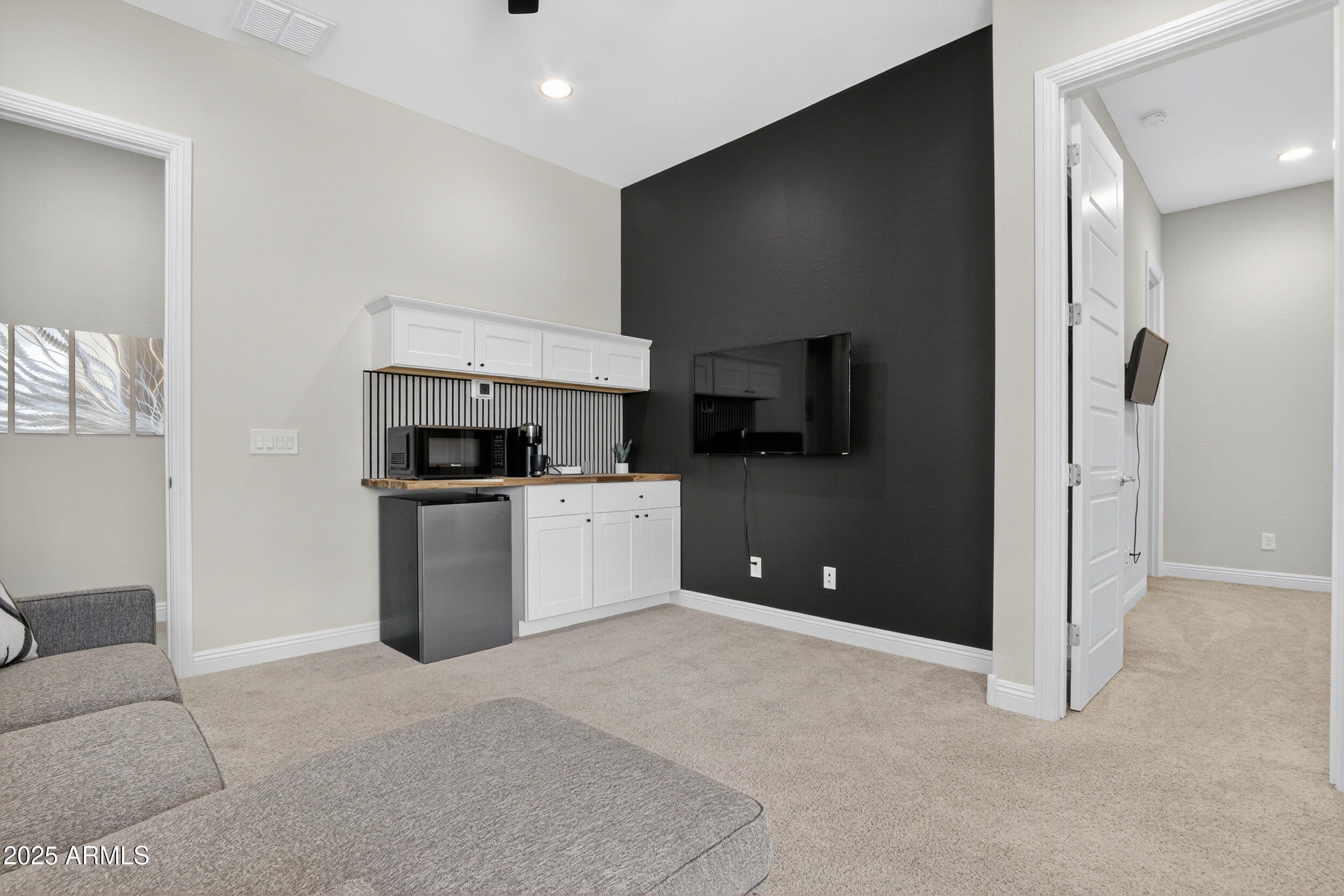 22678 East Stacey Road Queen Creek, AZ 85142 - Photo 50 of 101 a kitchen with stainless steel appliances a refrigerator and a microwave
