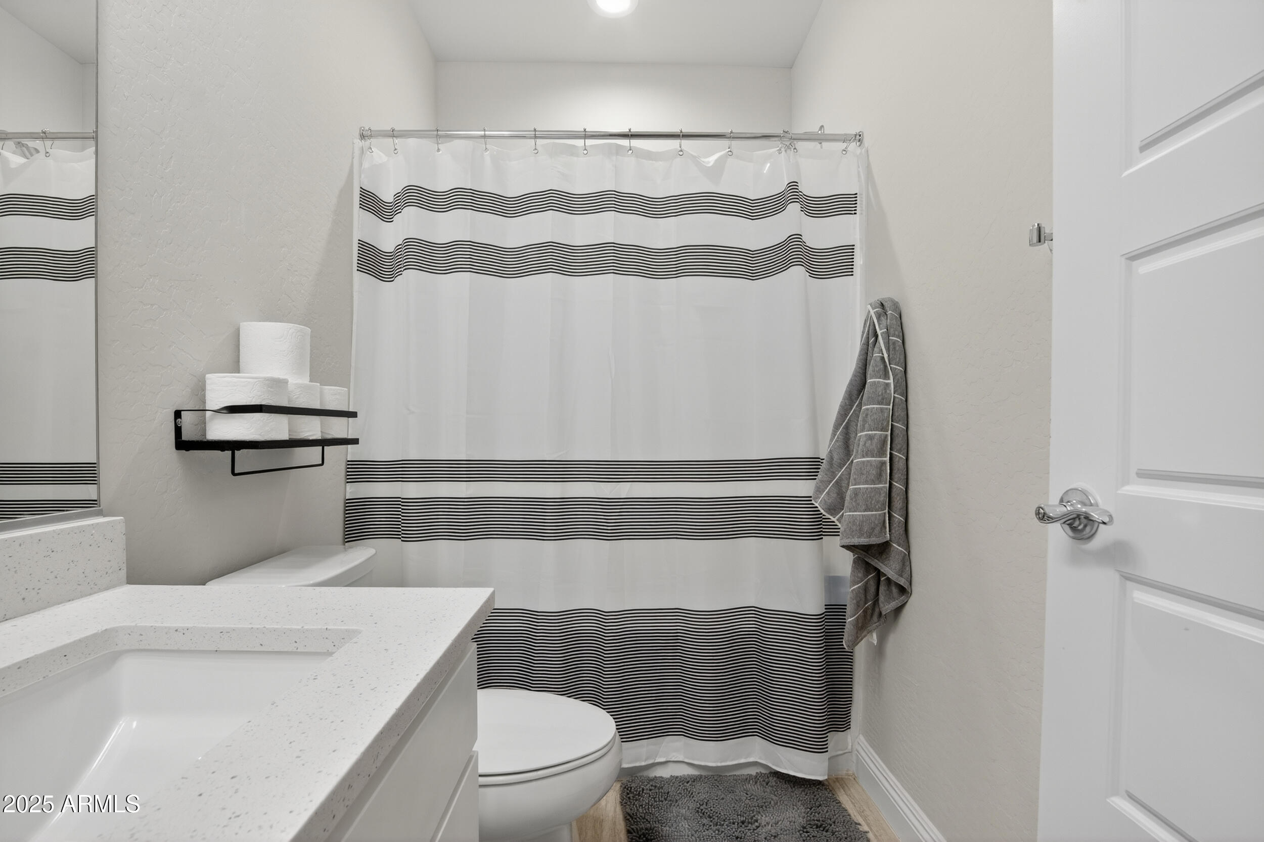 22678 East Stacey Road Queen Creek, AZ 85142 - Photo 53 of 101 a bathroom with a toilet and a shower