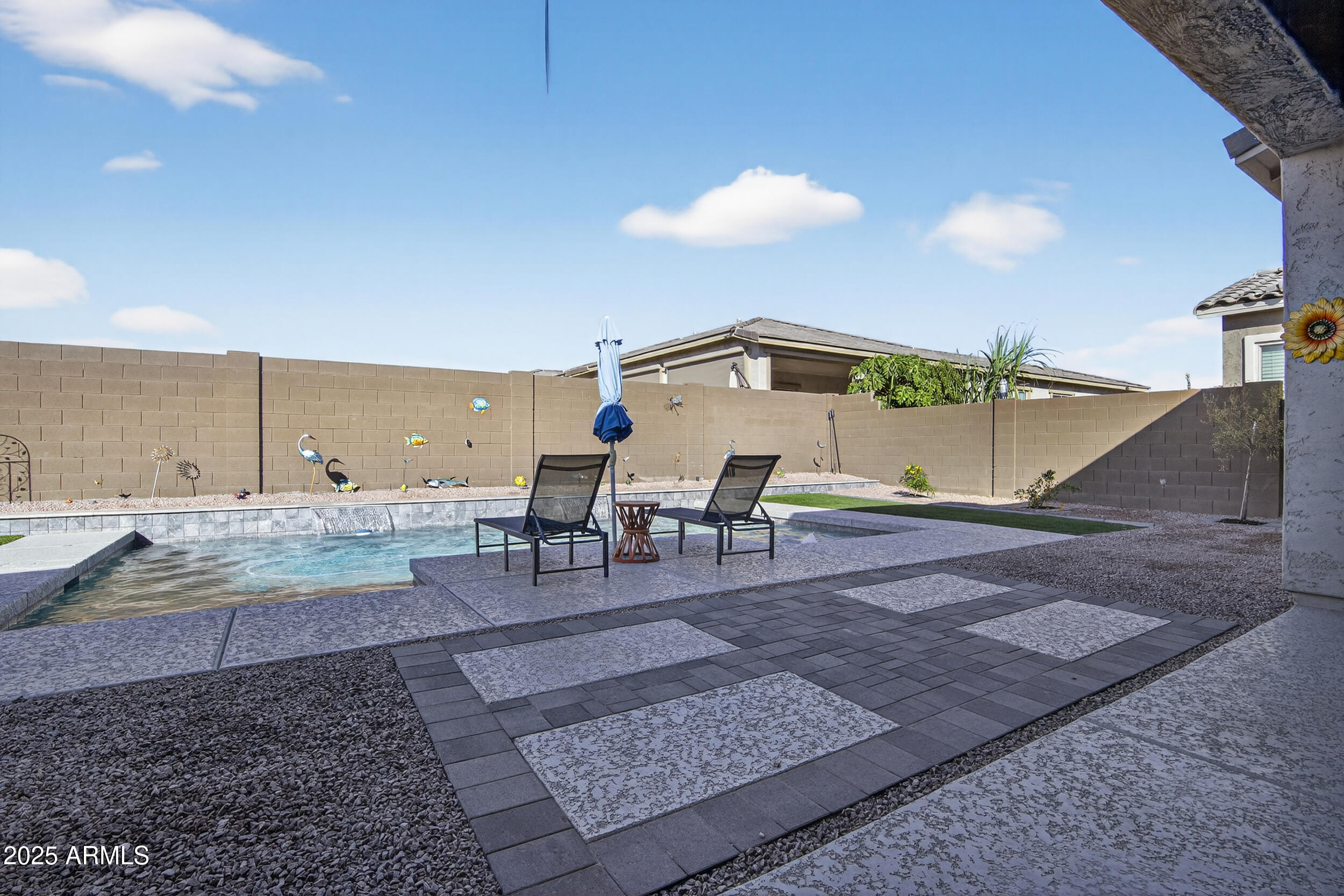 22678 East Stacey Road Queen Creek, AZ 85142 - Photo 74 of 101 a view of a outdoor kitchen with a table and chairs