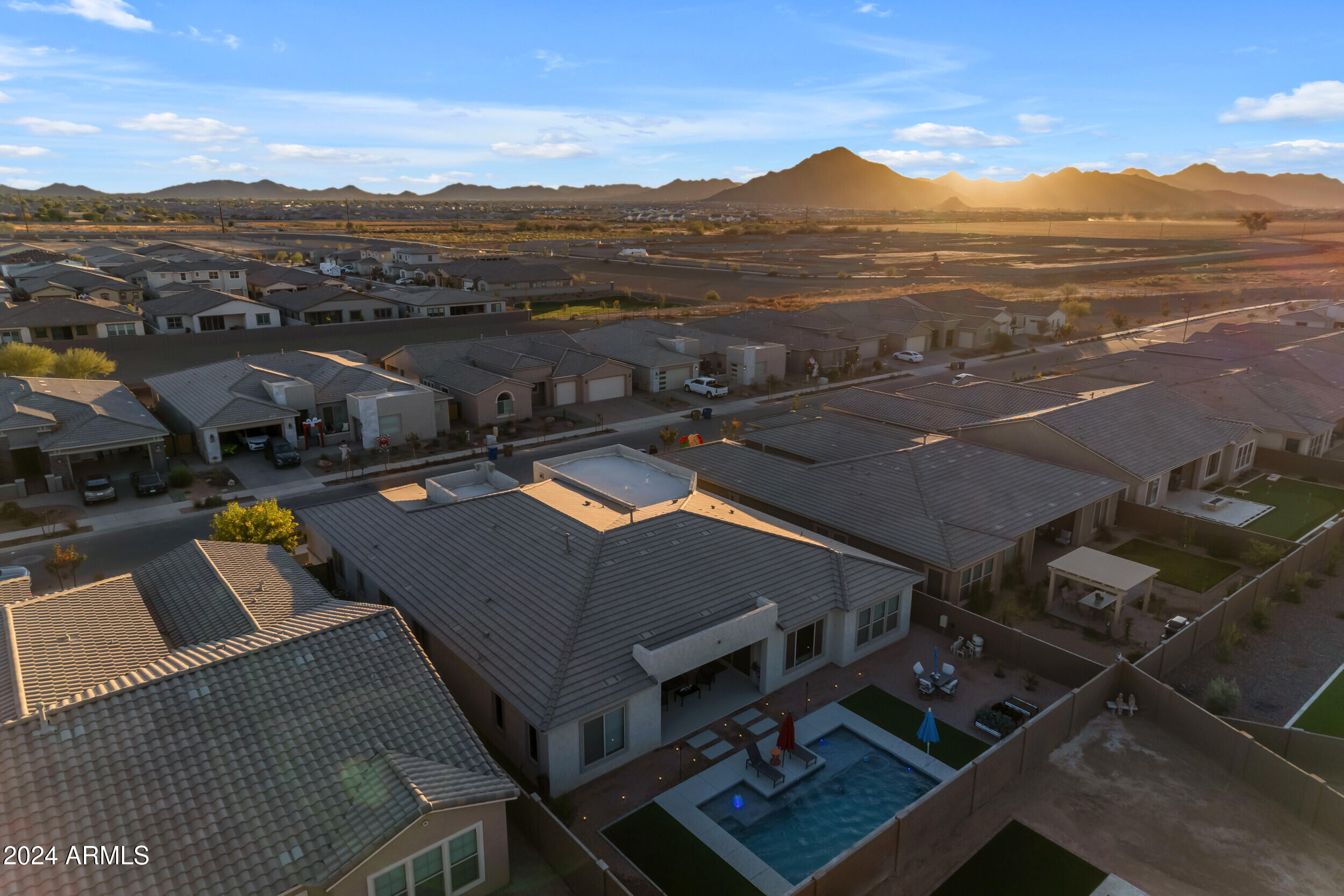 22678 East Stacey Road Queen Creek, AZ 85142 - Photo 85 of 101 an aerial view of residential houses with outdoor space