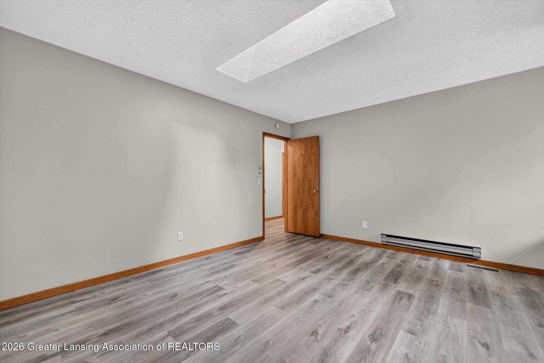 12916 Rambler Road Dewitt, MI 48820 - Photo 23 of 59 26-12916-Rambler-Rd-WindowStill-Photogra