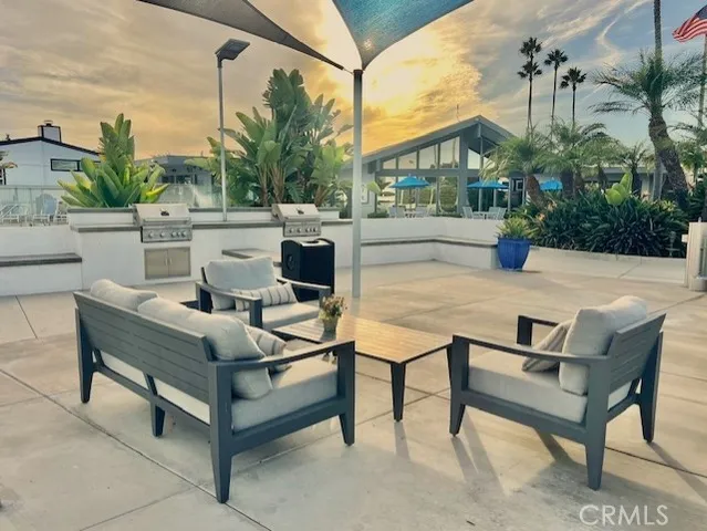 a view of an outdoor sitting area with couch