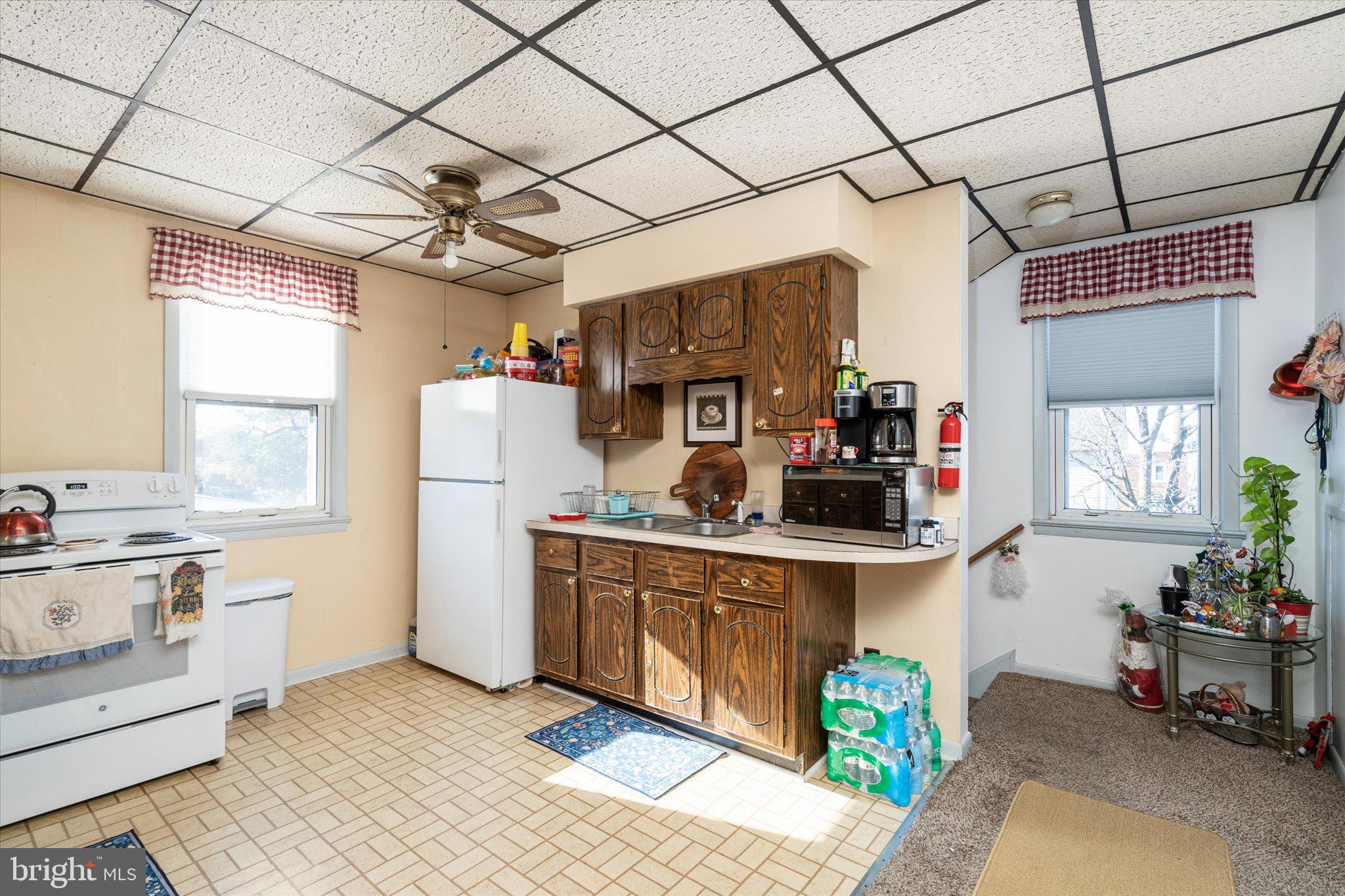 130 North Fairview Street Riverside, NJ 08075 - Photo 20 of 34 a kitchen with a sink appliances and cabinets