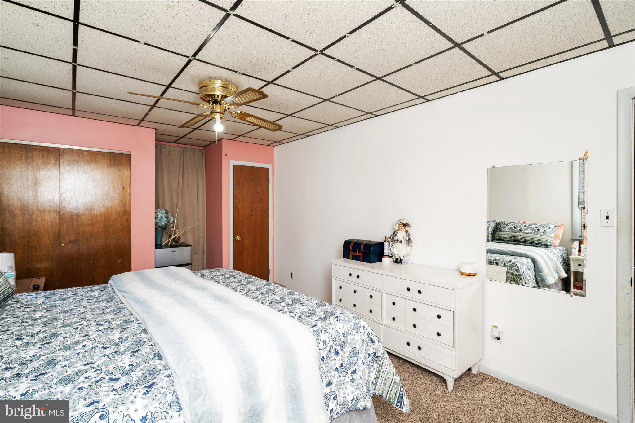 130 North Fairview Street Riverside, NJ 08075 - Photo 25 of 34 a bedroom with a bed and a walk in closet