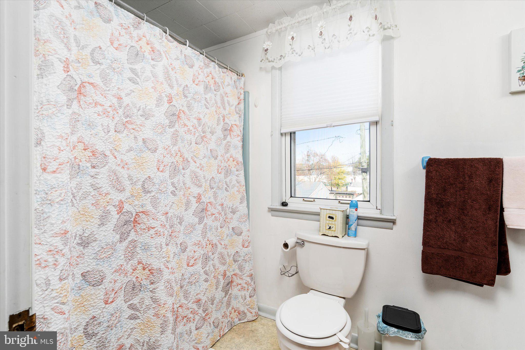 130 North Fairview Street Riverside, NJ 08075 - Photo 27 of 34 a white toilet sitting next to a bathroom sink
