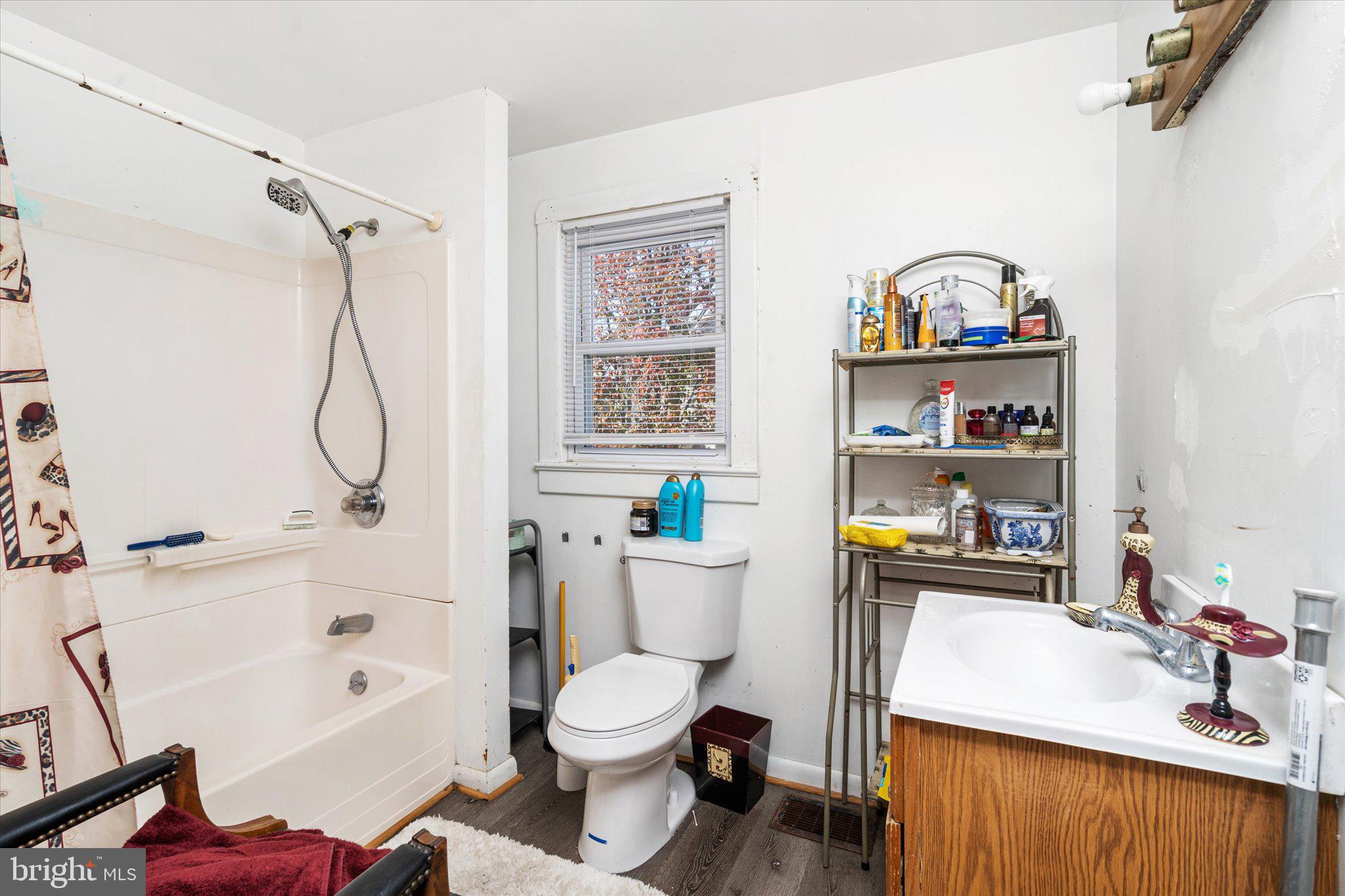 130 North Fairview Street Riverside, NJ 08075 - Photo 8 of 34 a bathroom with a sink a toilet and a shower