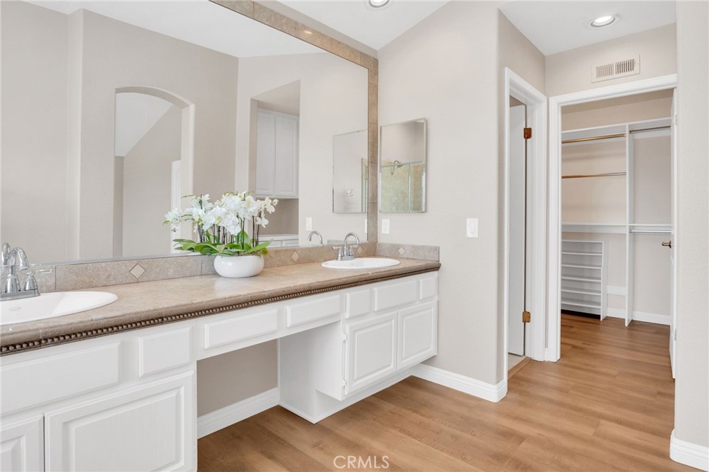 33 Dauphin Dana Point, CA 92629 - Photo 14 of 26 a bathroom with a double vanity sink and a mirror