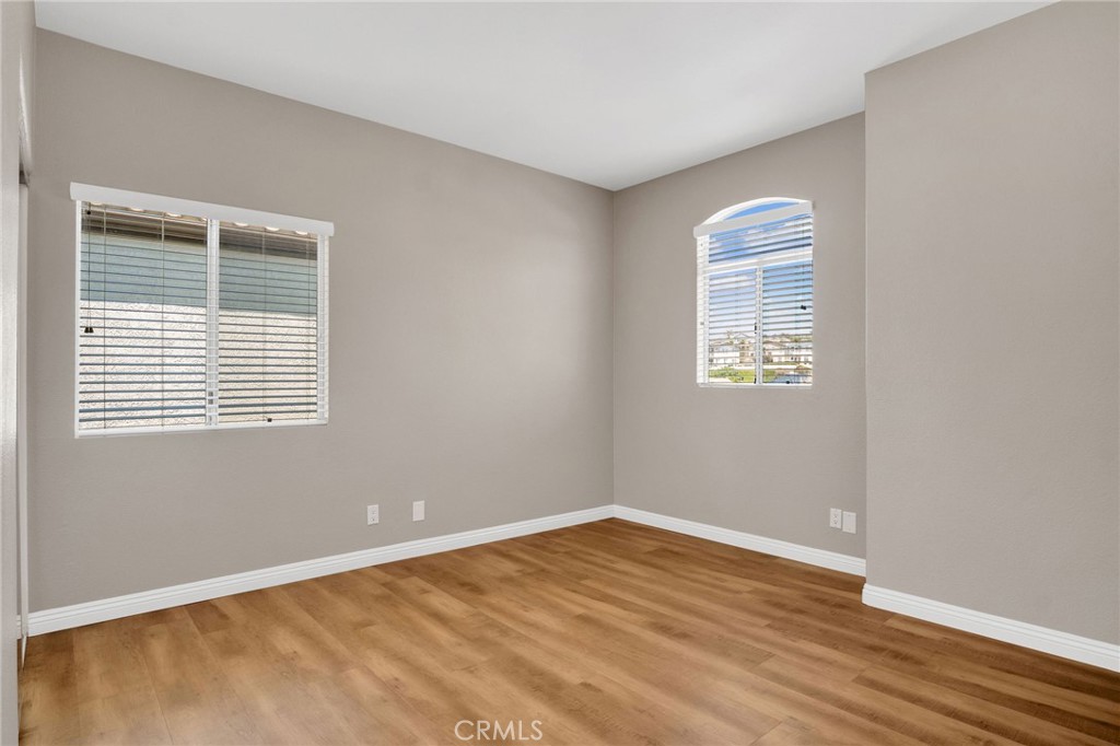 33 Dauphin Dana Point, CA 92629 - Photo 19 of 26 a view of an empty room with wooden floor and a window
