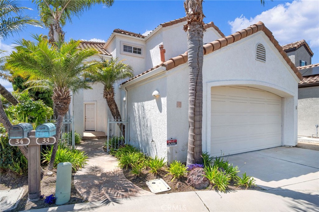 33 Dauphin Dana Point, CA 92629 - Photo 24 of 26 a front view of a house with a yard