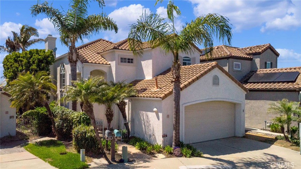 33 Dauphin Dana Point, CA 92629 - Photo 25 of 26 a front view of a house with a yard