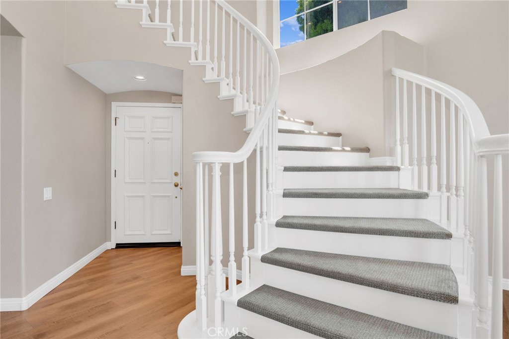 33 Dauphin Dana Point, CA 92629 - Photo 4 of 26 a view of entryway and hall with wooden floor