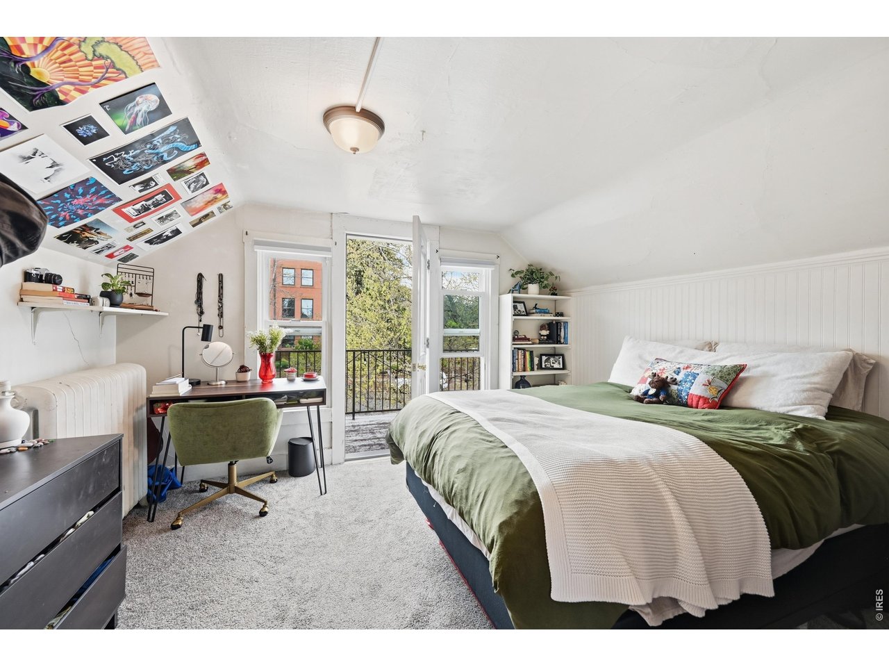 856 10th Street Boulder, CO 80302 - Photo 15 of 28 a bedroom with a bed and a large window