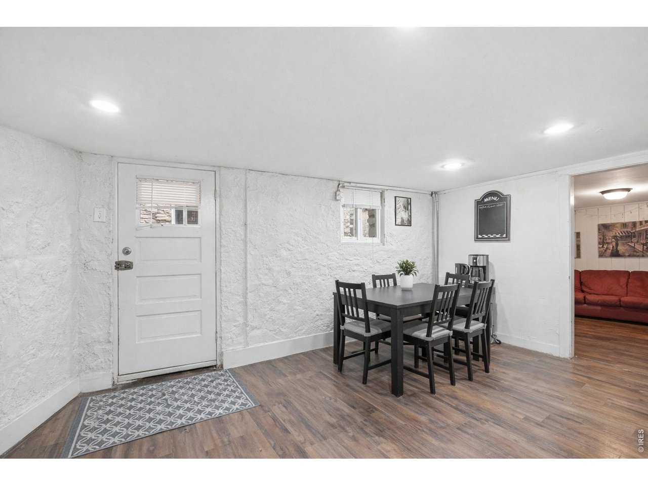 856 10th Street Boulder, CO 80302 - Photo 20 of 28 a view of a dining room with furniture and wooden floor