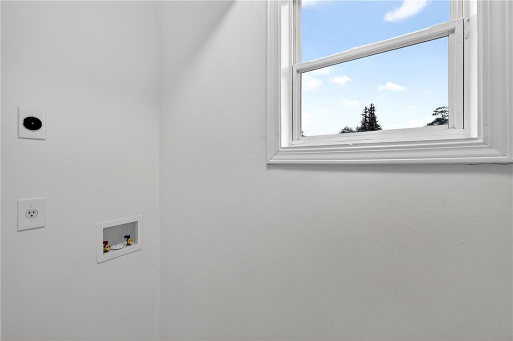 6716 Colchester Place Northwest Norcross, GA 30093 - Photo 8 of 23 a view of a livingroom with a window