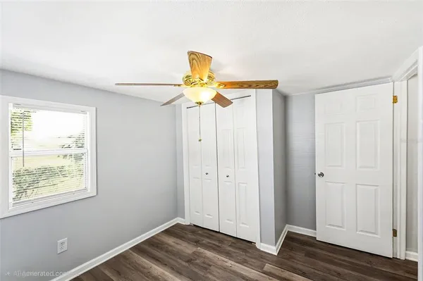 a view of entryway with wooden floor