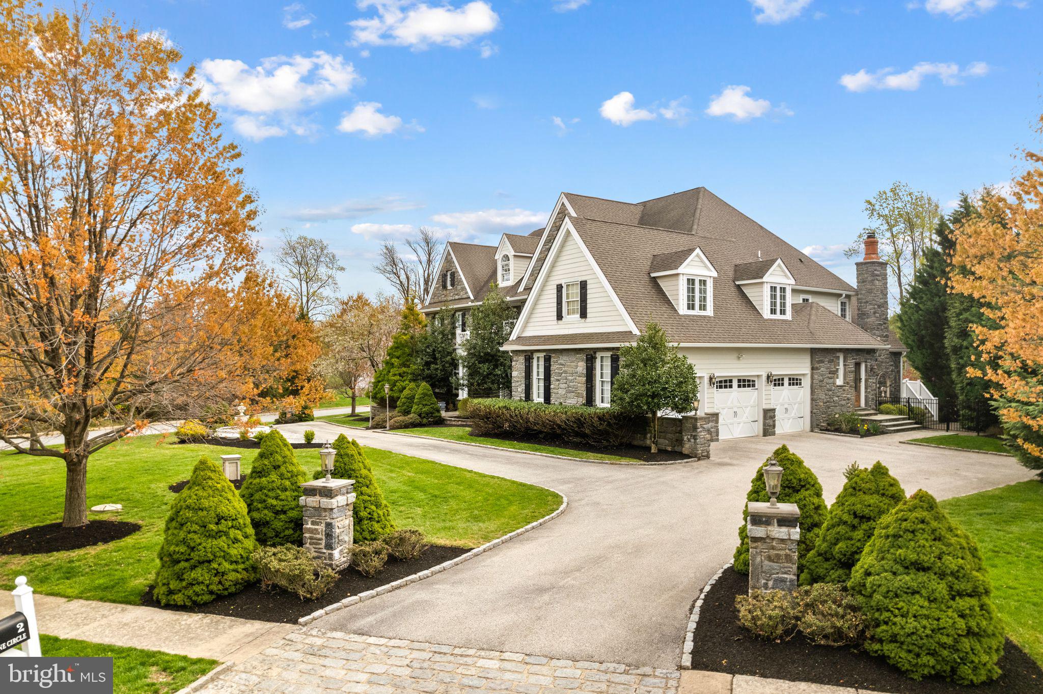 2 Greystone Circle Newtown Square, PA 19073 - Photo 2 of 57 a front view of a house with garden