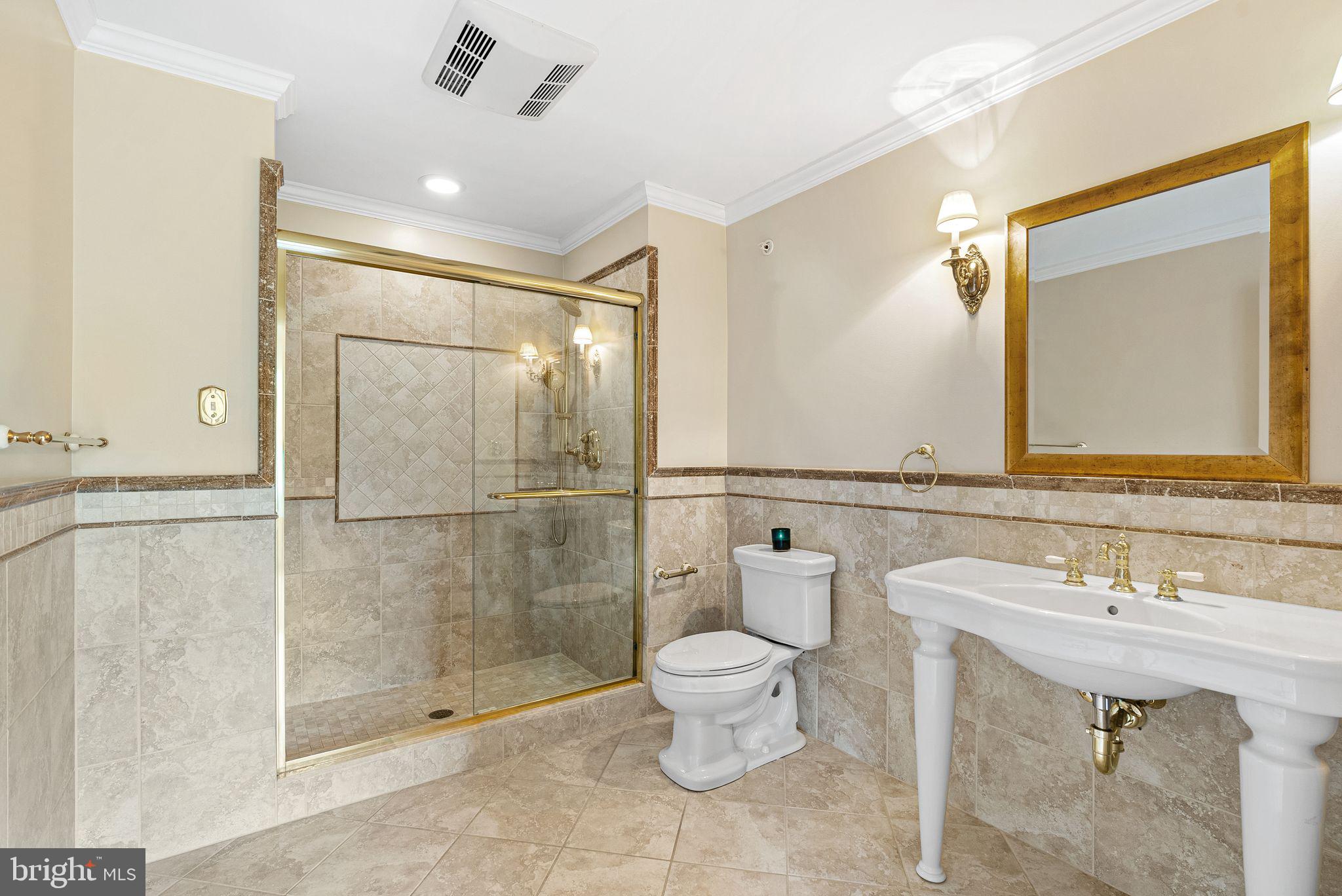 2 Greystone Circle Newtown Square, PA 19073 - Photo 24 of 57 a bathroom with a sink toilet and shower
