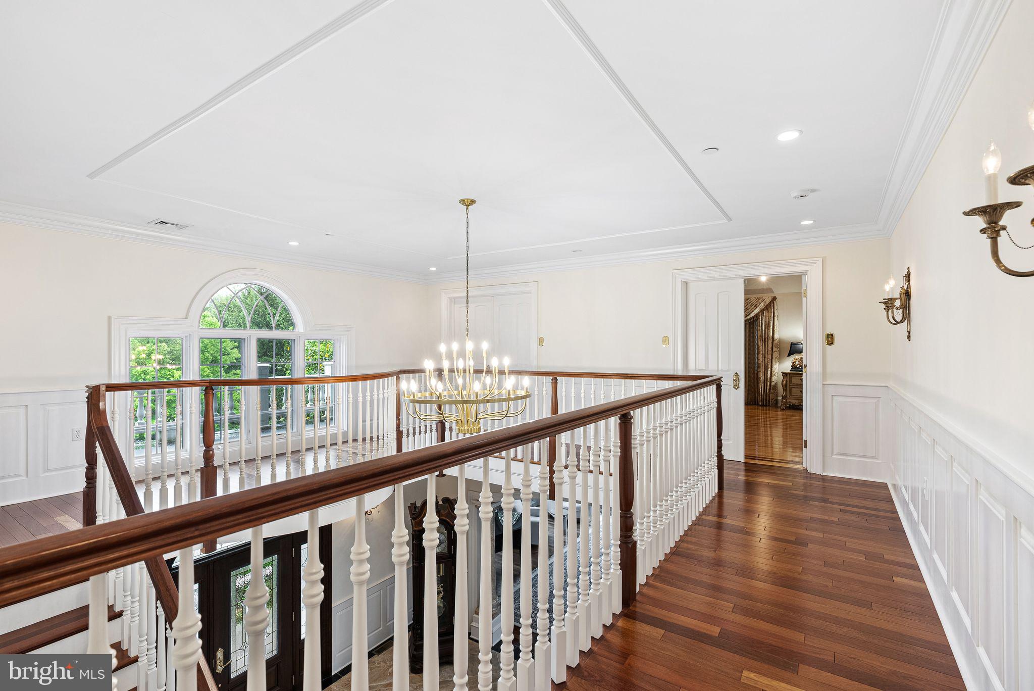 2 Greystone Circle Newtown Square, PA 19073 - Photo 25 of 57 a view of staircase with wooden floor and window
